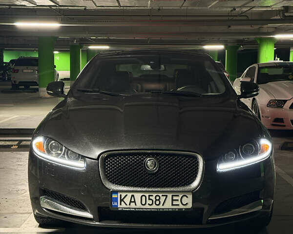 Черный Ягуар ХФ, объемом двигателя 3 л и пробегом 89 тыс. км за 14700 $, фото 1 на Automoto.ua