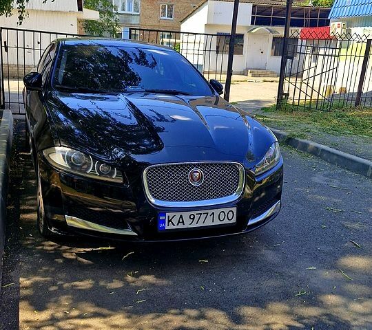 Чорний Ягуар ХФ, об'ємом двигуна 2.2 л та пробігом 160 тис. км за 12500 $, фото 1 на Automoto.ua