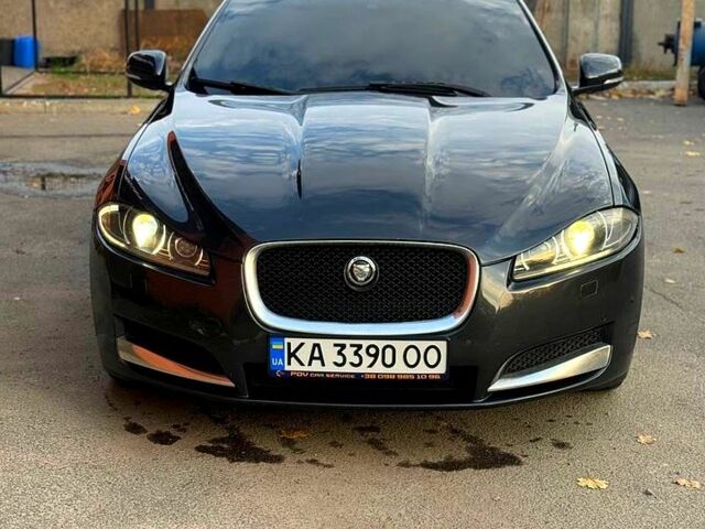 Черный Ягуар ХФ, объемом двигателя 2 л и пробегом 191 тыс. км за 11500 $, фото 1 на Automoto.ua