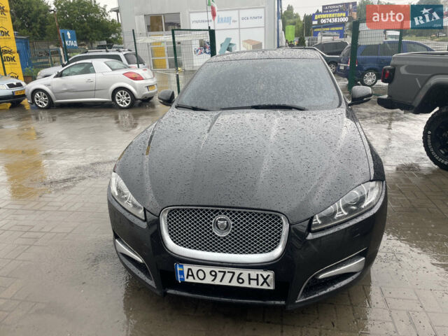 Черный Ягуар ХФ, объемом двигателя 2.99 л и пробегом 320 тыс. км за 13000 $, фото 1 на Automoto.ua