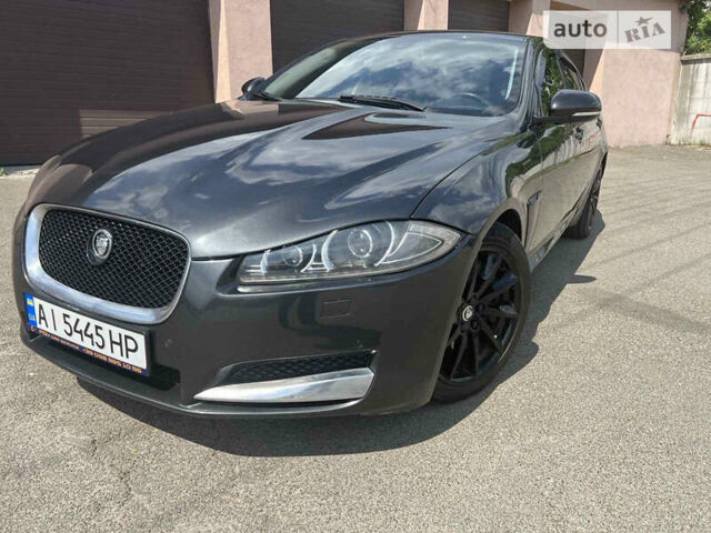 Черный Ягуар ХФ, объемом двигателя 2 л и пробегом 172 тыс. км за 10700 $, фото 1 на Automoto.ua