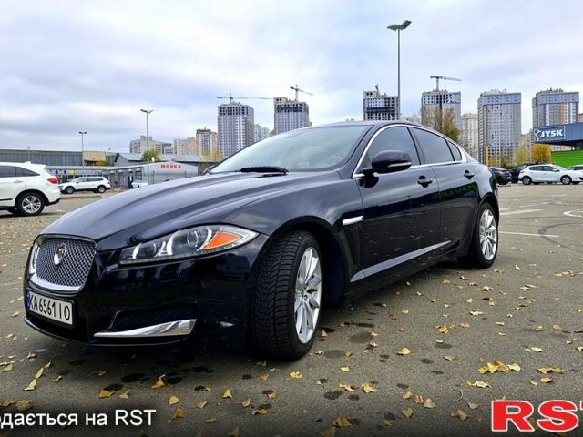 Черный Ягуар ХФ, объемом двигателя 2 л и пробегом 129 тыс. км за 16200 $, фото 1 на Automoto.ua