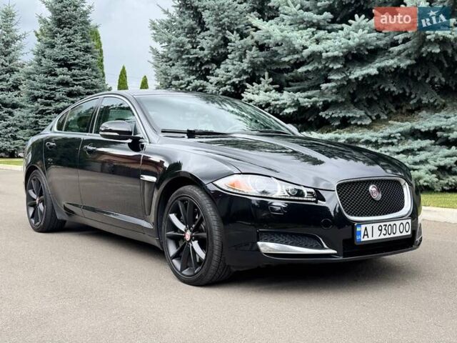 Черный Ягуар ХФ, объемом двигателя 3 л и пробегом 130 тыс. км за 16900 $, фото 1 на Automoto.ua