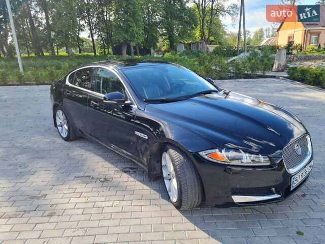 Черный Ягуар ХФ, объемом двигателя 3 л и пробегом 152 тыс. км за 15950 $, фото 1 на Automoto.ua
