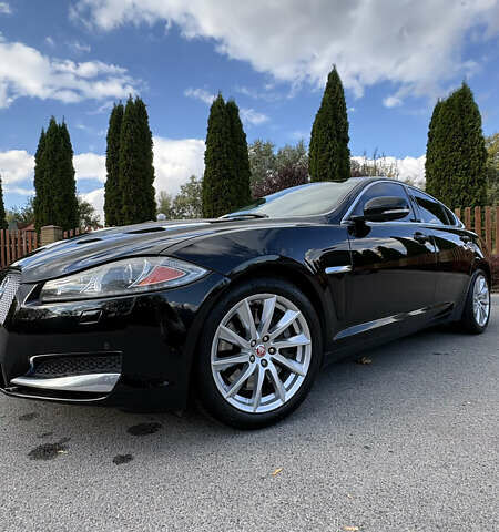 Черный Ягуар ХФ, объемом двигателя 2 л и пробегом 187 тыс. км за 11500 $, фото 1 на Automoto.ua