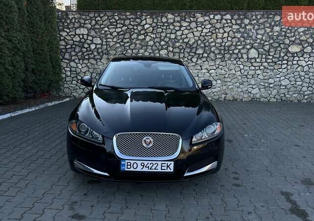 Черный Ягуар ХФ, объемом двигателя 2 л и пробегом 215 тыс. км за 12800 $, фото 1 на Automoto.ua