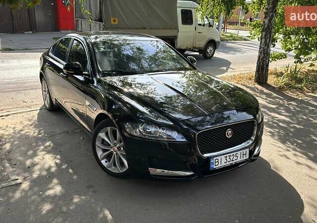 Черный Ягуар ХФ, объемом двигателя 2 л и пробегом 65 тыс. км за 17200 $, фото 1 на Automoto.ua