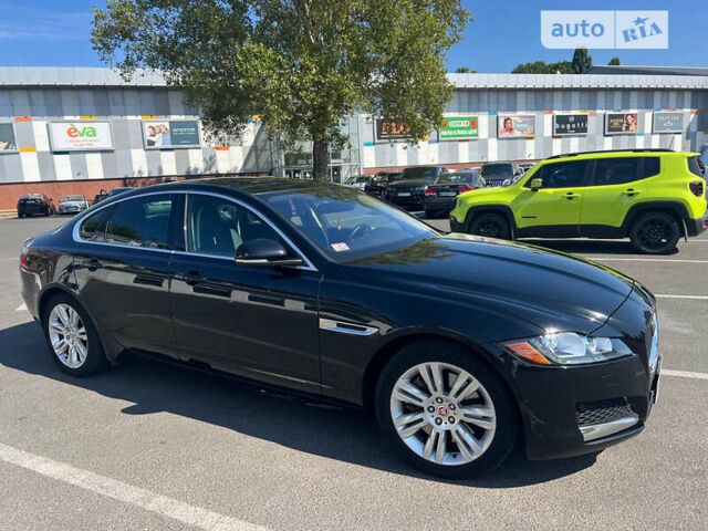 Черный Ягуар ХФ, объемом двигателя 3 л и пробегом 75 тыс. км за 16000 $, фото 1 на Automoto.ua