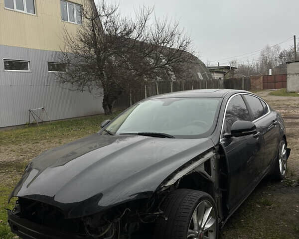 Черный Ягуар ХФ, объемом двигателя 3 л и пробегом 150 тыс. км за 8000 $, фото 1 на Automoto.ua