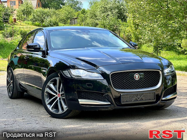 Черный Ягуар ХФ, объемом двигателя 2 л и пробегом 125 тыс. км за 17400 $, фото 1 на Automoto.ua
