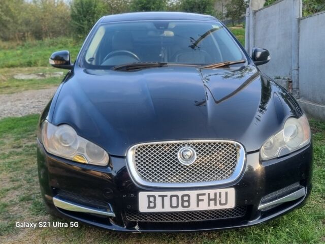 Черный Ягуар ХФ, объемом двигателя 3 л и пробегом 170 тыс. км за 38000 $, фото 1 на Automoto.ua