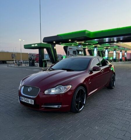 Красный Ягуар ХФ, объемом двигателя 3 л и пробегом 86 тыс. км за 9900 $, фото 1 на Automoto.ua