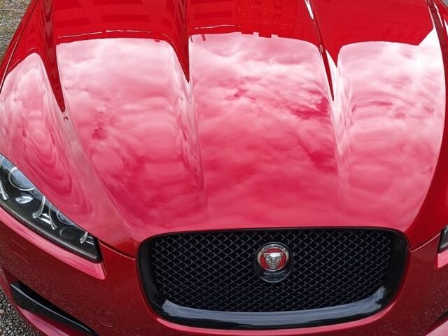 Красный Ягуар ХФ, объемом двигателя 3 л и пробегом 150 тыс. км за 15196 $, фото 1 на Automoto.ua