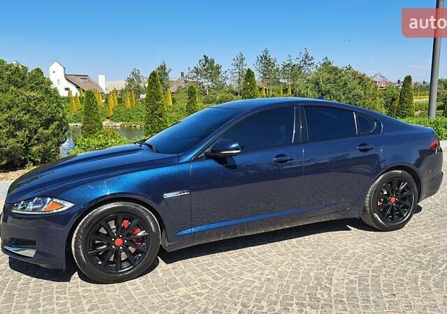 Синий Ягуар ХФ, объемом двигателя 2 л и пробегом 142 тыс. км за 9100 $, фото 1 на Automoto.ua