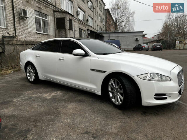 Білий Ягуар Ікс Джей, об'ємом двигуна 3 л та пробігом 150 тис. км за 20000 $, фото 1 на Automoto.ua