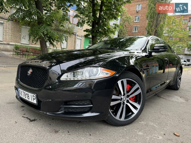 Черный Ягуар Икс Джей, объемом двигателя 3 л и пробегом 219 тыс. км за 33000 $, фото 1 на Automoto.ua