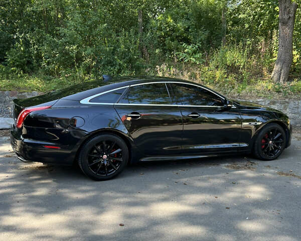 Черный Ягуар Икс Джей, объемом двигателя 2.97 л и пробегом 116 тыс. км за 22000 $, фото 1 на Automoto.ua