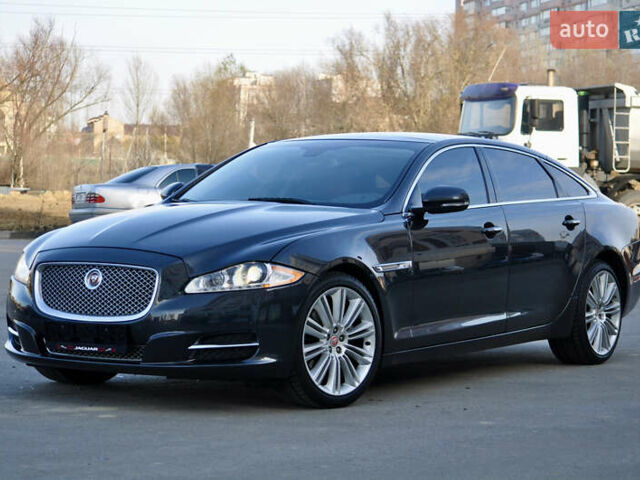 Черный Ягуар Икс Джей, объемом двигателя 3 л и пробегом 179 тыс. км за 16500 $, фото 1 на Automoto.ua