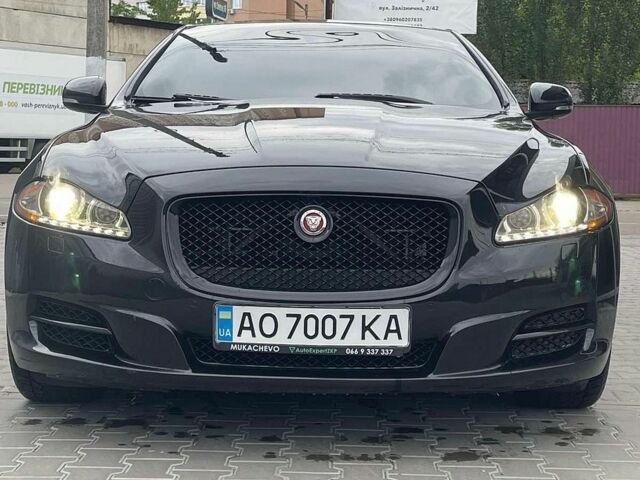 Чорний Ягуар Ікс Джей, об'ємом двигуна 3 л та пробігом 125 тис. км за 23100 $, фото 1 на Automoto.ua