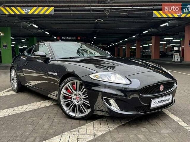 Черный Ягуар ХК, объемом двигателя 5 л и пробегом 65 тыс. км за 33990 $, фото 1 на Automoto.ua