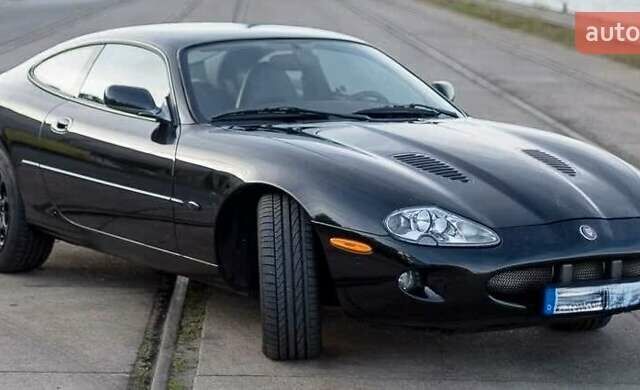 Синий Ягуар ХК, объемом двигателя 4 л и пробегом 999 тыс. км за 20960 $, фото 1 на Automoto.ua