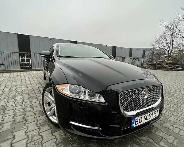 Черный Ягуар XJL, объемом двигателя 3 л и пробегом 146 тыс. км за 27000 $, фото 1 на Automoto.ua