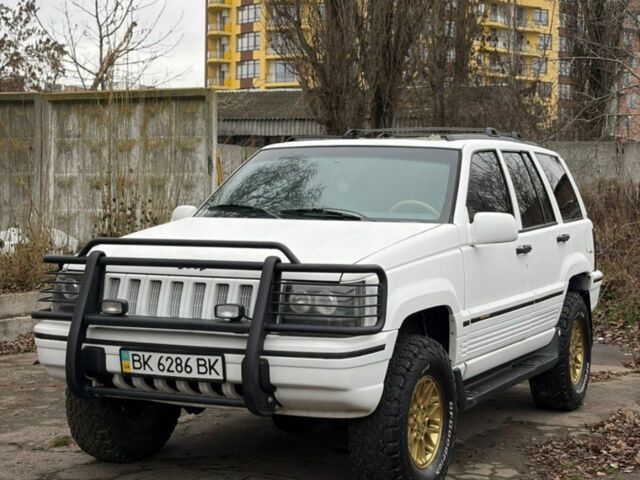 Білий Джип Cherokee, об'ємом двигуна 5.2 л та пробігом 250 тис. км за 5000 $, фото 1 на Automoto.ua