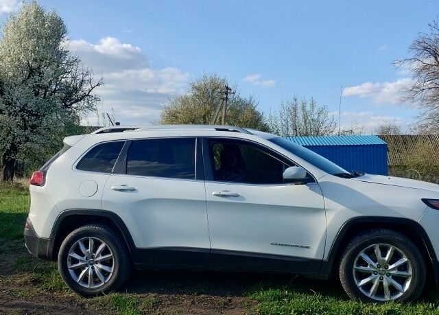 Білий Джип Cherokee, об'ємом двигуна 3.2 л та пробігом 214 тис. км за 14741 $, фото 1 на Automoto.ua