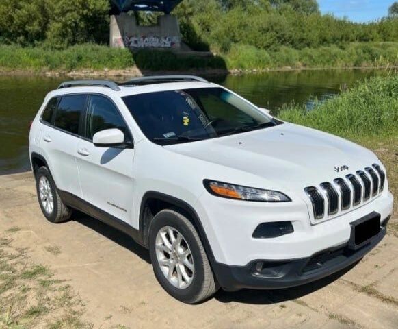 Белый Джип Чероки, объемом двигателя 3.2 л и пробегом 129 тыс. км за 10000 $, фото 1 на Automoto.ua