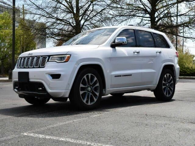 Білий Джип Cherokee, об'ємом двигуна 5.7 л та пробігом 73 тис. км за 14500 $, фото 1 на Automoto.ua
