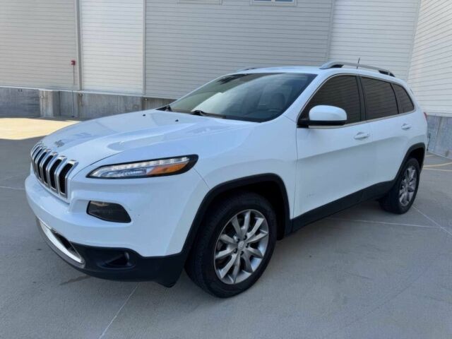 Білий Джип Cherokee, об'ємом двигуна 2.4 л та пробігом 52 тис. км за 11800 $, фото 1 на Automoto.ua