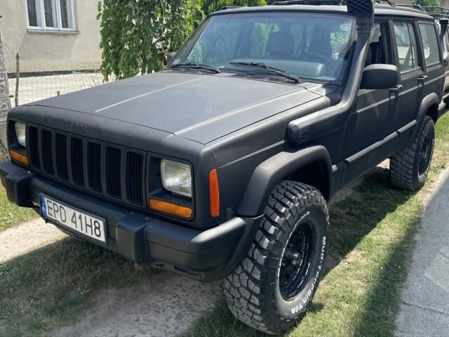 Чорний Джип Cherokee, об'ємом двигуна 4 л та пробігом 230 тис. км за 5737 $, фото 1 на Automoto.ua