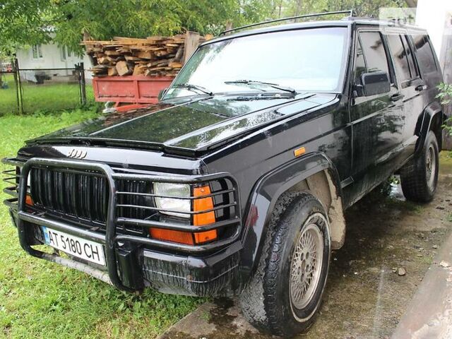 Чорний Джип Cherokee, об'ємом двигуна 4 л та пробігом 270 тис. км за 5700 $, фото 1 на Automoto.ua