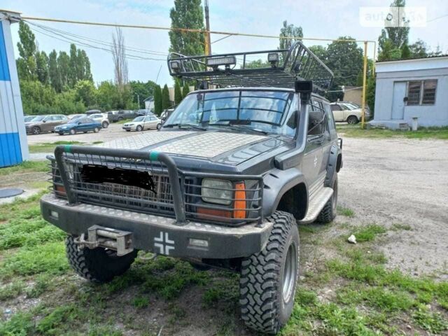Черный Джип Чероки, объемом двигателя 4 л и пробегом 236 тыс. км за 4000 $, фото 1 на Automoto.ua