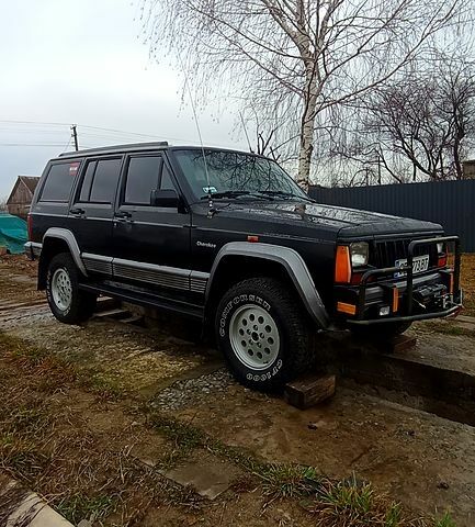 Чорний Джип Cherokee, об'ємом двигуна 2.5 л та пробігом 288 тис. км за 6700 $, фото 1 на Automoto.ua