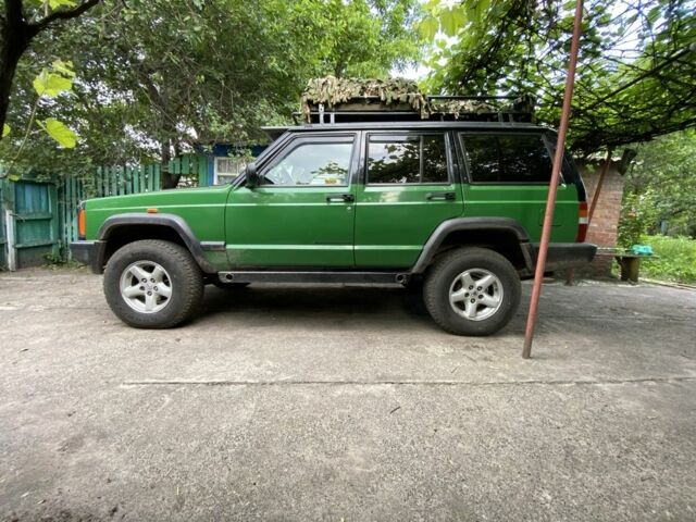 Черный Джип Чероки, объемом двигателя 2.5 л и пробегом 230 тыс. км за 6700 $, фото 1 на Automoto.ua