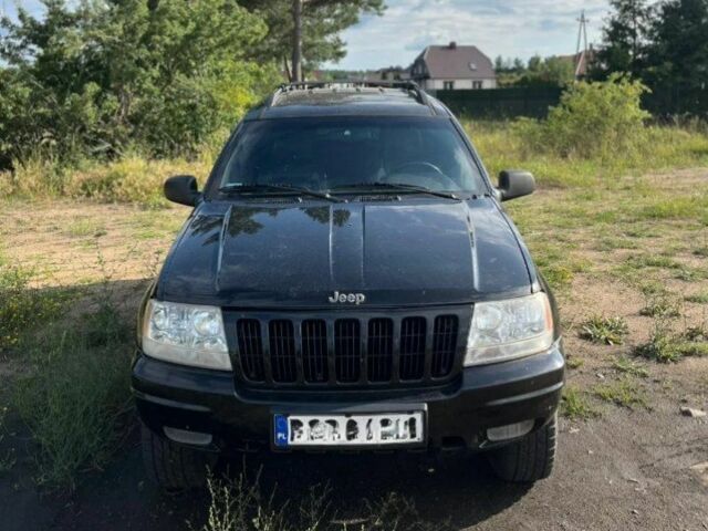 Черный Джип Чероки, объемом двигателя 4.7 л и пробегом 270 тыс. км за 3000 $, фото 1 на Automoto.ua