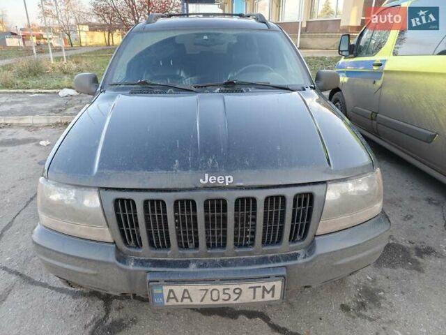 Черный Джип Чероки, объемом двигателя 4.7 л и пробегом 365 тыс. км за 6999 $, фото 1 на Automoto.ua