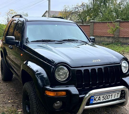 Чорний Джип Cherokee, об'ємом двигуна 2.5 л та пробігом 185 тис. км за 7500 $, фото 1 на Automoto.ua