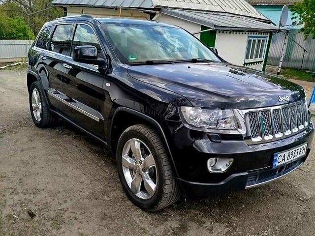 Чорний Джип Cherokee, об'ємом двигуна 3 л та пробігом 290 тис. км за 17000 $, фото 1 на Automoto.ua