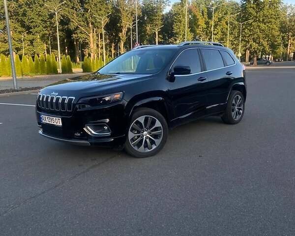 Чорний Джип Cherokee, об'ємом двигуна 2 л та пробігом 175 тис. км за 15900 $, фото 1 на Automoto.ua