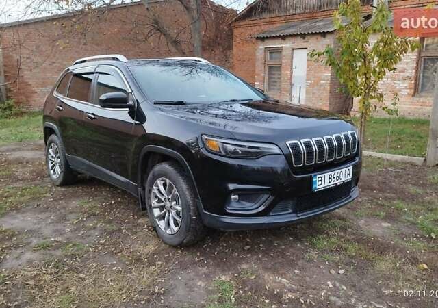 Чорний Джип Cherokee, об'ємом двигуна 2.36 л та пробігом 115 тис. км за 20000 $, фото 1 на Automoto.ua