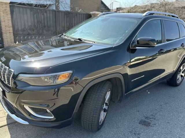 Черный Джип Чероки, объемом двигателя 2.4 л и пробегом 117 тыс. км за 11000 $, фото 1 на Automoto.ua