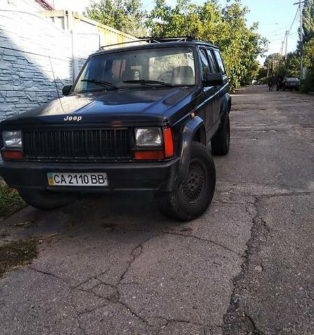 Чорний Джип Cherokee, об'ємом двигуна 4 л та пробігом 10 тис. км за 3200 $, фото 1 на Automoto.ua