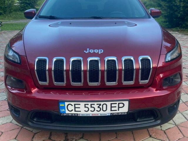 Красный Джип Чероки, объемом двигателя 2.4 л и пробегом 223 тыс. км за 12300 $, фото 1 на Automoto.ua