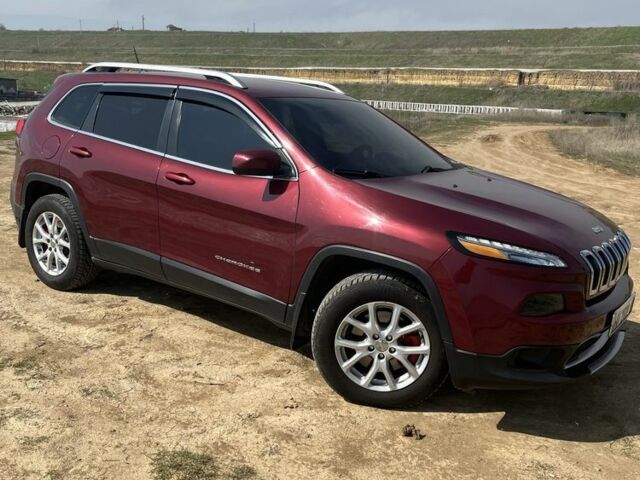 Червоний Джип Cherokee, об'ємом двигуна 2.4 л та пробігом 146 тис. км за 12800 $, фото 1 на Automoto.ua
