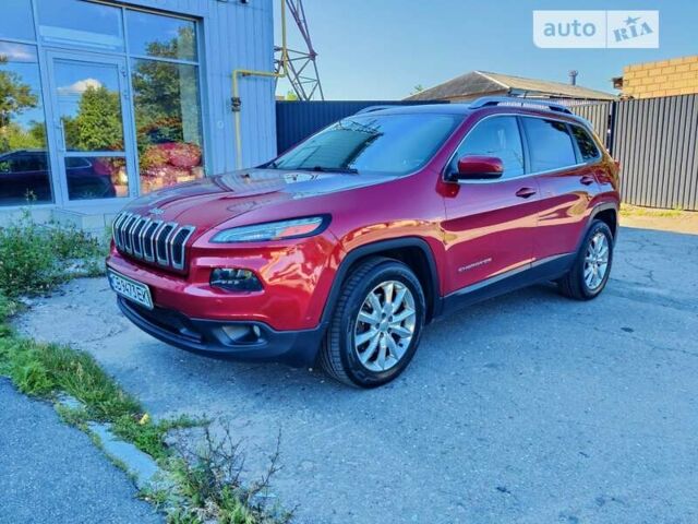 Червоний Джип Cherokee, об'ємом двигуна 2.36 л та пробігом 200 тис. км за 15000 $, фото 1 на Automoto.ua