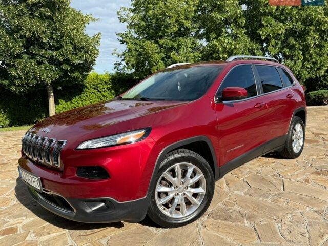 Червоний Джип Cherokee, об'ємом двигуна 2.36 л та пробігом 68 тис. км за 14200 $, фото 1 на Automoto.ua