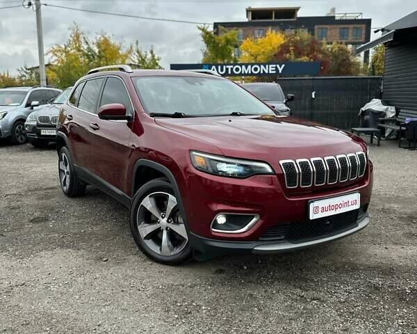 Красный Джип Чероки, объемом двигателя 2 л и пробегом 87 тыс. км за 17999 $, фото 1 на Automoto.ua