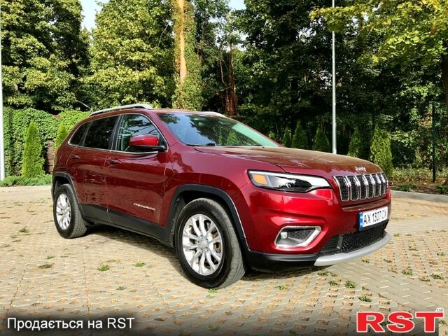 Красный Джип Чероки, объемом двигателя 2.4 л и пробегом 210 тыс. км за 14500 $, фото 1 на Automoto.ua